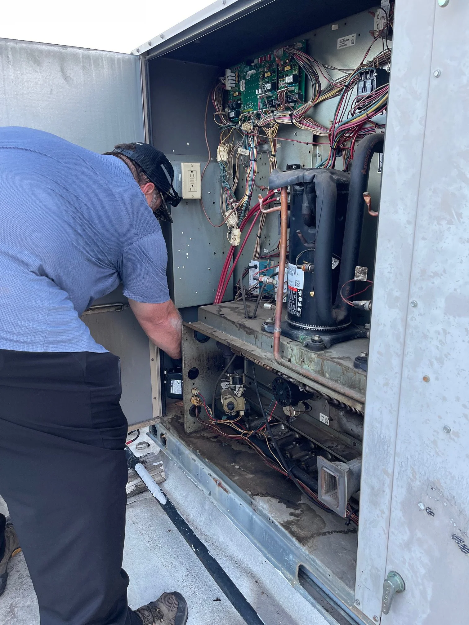 Our Senior Tech preparing this commercial rooftop gas package unit for removal/ replacement in Frisco, Texas