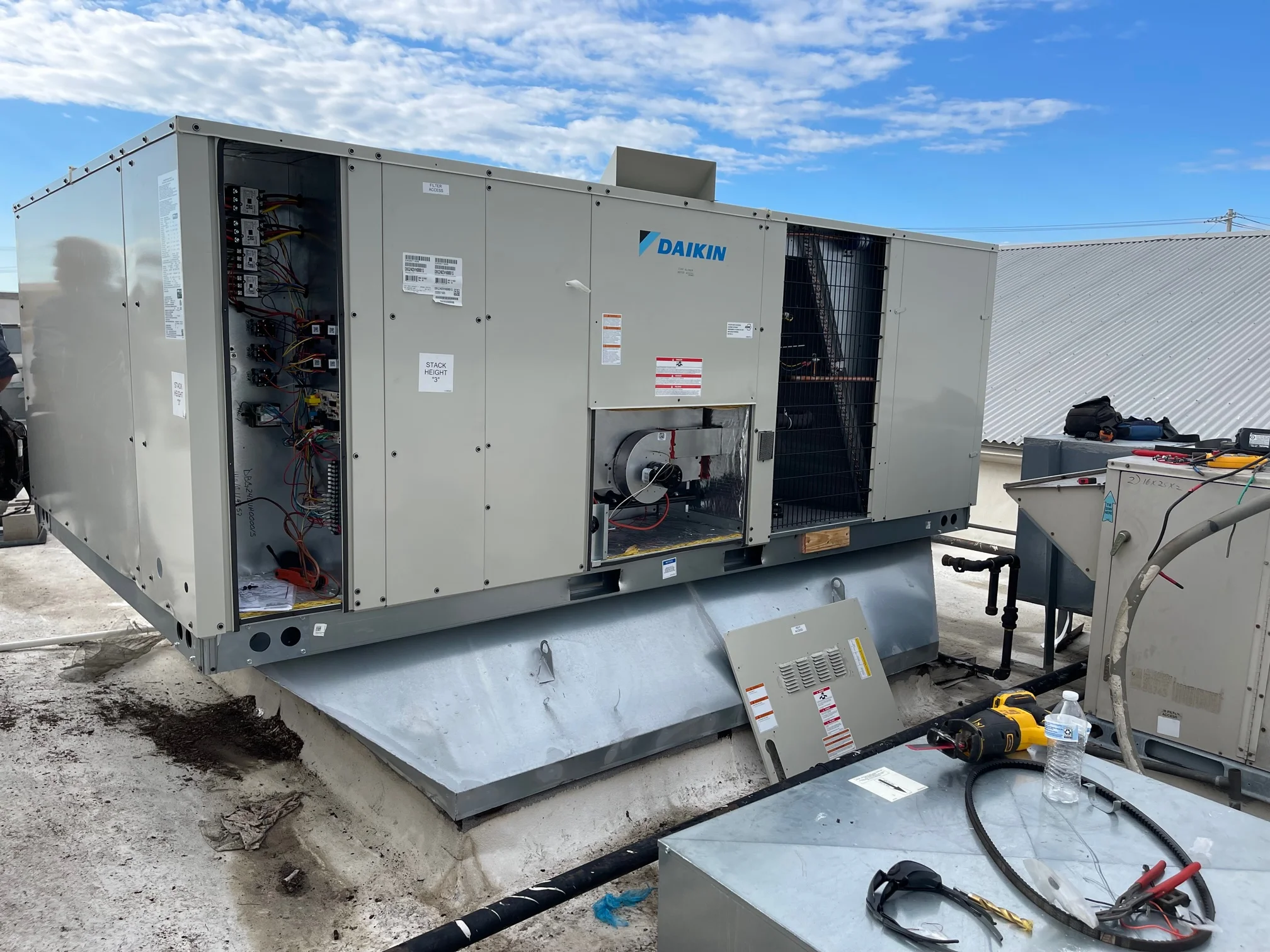 Preparing to connect gas line on this Daikin 20 ton commercial rooftop gas package unit installation in Frisco, Texas
